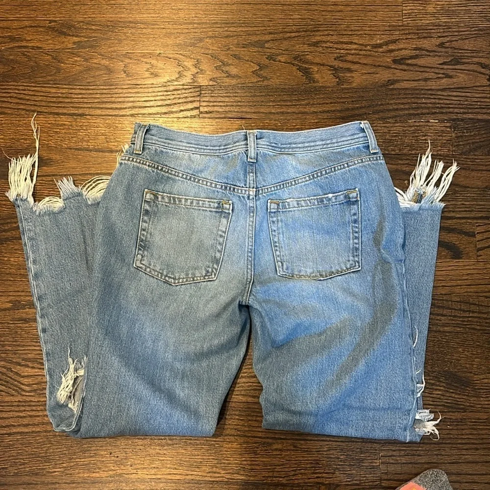 Free People jeans Maggie straight leg with big knee rips and raw hem, size 28